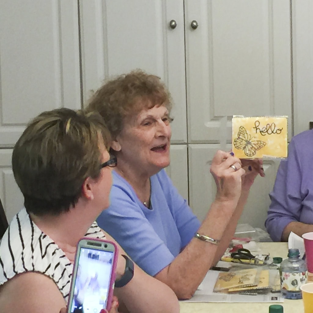 Margie showing her swap card