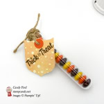 Stampin' Up! Treat Tube filled with candy make a great Halloween gift. This one is decorated with the Best Badge punch and Painted Autumn DSP by Stamp Candy