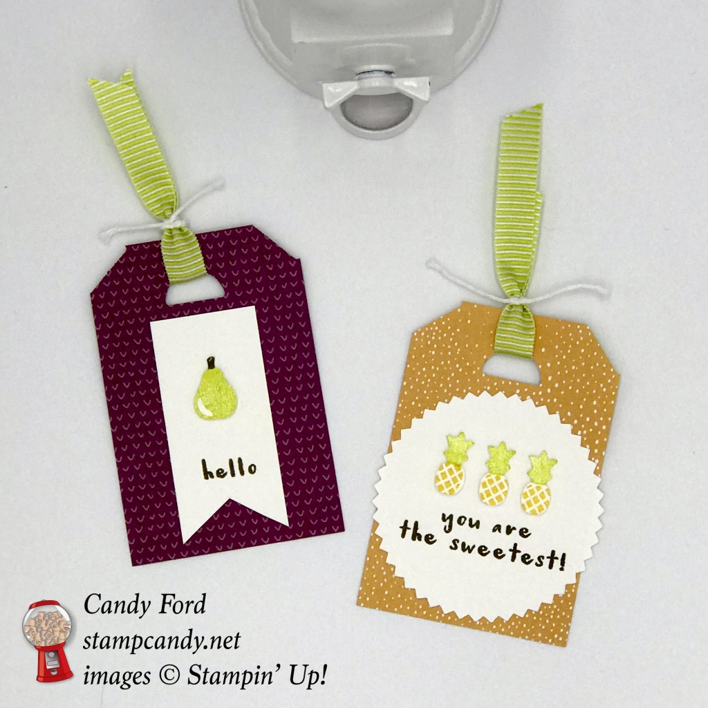 Tags made with the Tutti-frutti swuite: Tutti-frutti Designer Series Paper DSP, Fruit Basket Bundle (Fruit Basket stamp set and Itty Bitty Fruit Punch Pack,) and Lemon Lime Twist 3/8" Mini Striped Ribbon, also Whisper White Solid Twine, Starburst Punch, by Stampin' Up! #stampcandy